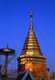 Thailand: Dusk settles over the chedi at Wat Phrathat Doi Kham, Chiang Mai, northern Thailand